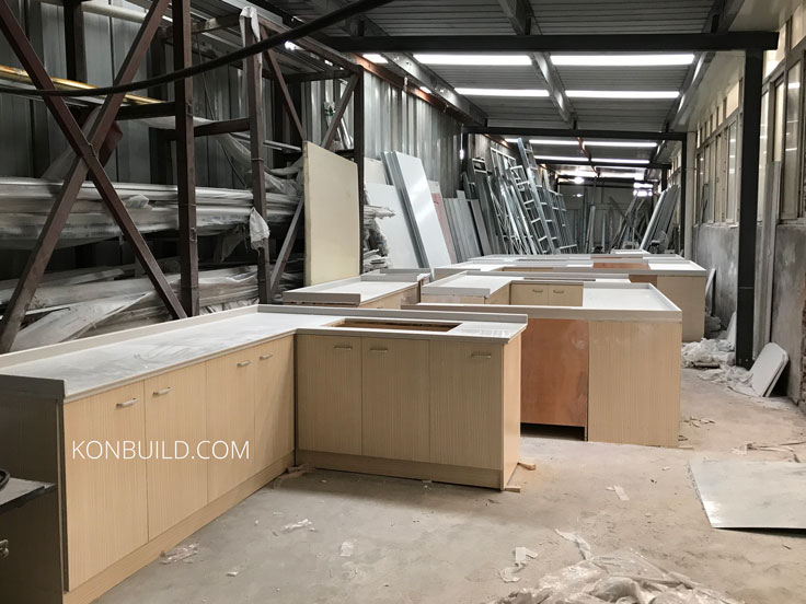 A container home kitchen's under construction.