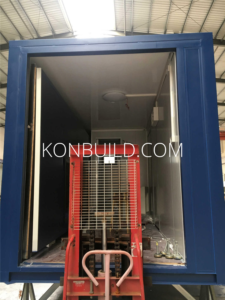 Interior under construction of a shipping container home.