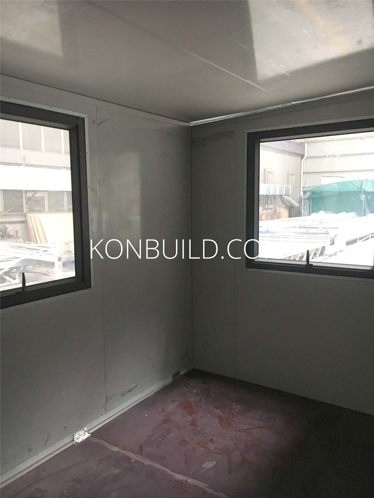 Shipping container home interior under construction.