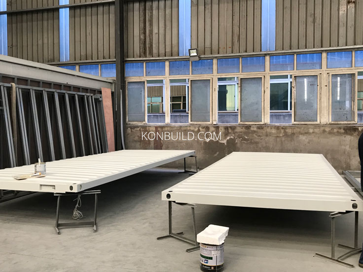 Shipping container homes panels being made.